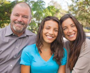 mother, father <em>&</em> daughter